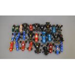 28 unboxed slot cars by Scalextric some are race cars and some are F1 type models, all vary in