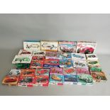 32 boxed, mainly car related, plastic Model Kits by 'Life-Like', Lindberg and others in various