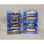 8 boxed Scalextric slot cars, which includes; #C3301 Mini Countryman WRC, #C3143 MGB  etc (8)