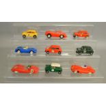 9 unboxed vintage Scalextric slot cars including Jaguar D type, Mini Cooper, Lister Jaguar etc.