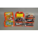 9 boxed slot car models by SCX, which includes; Mercedes Truck ESSO #83840.20, Seat Ibiza Coupe #