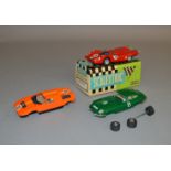 A scarce boxed Scalextric slot car Made in Spain, ref 4046 Porsche 917 in red together with two