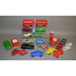 A group of unboxed plastic and tinplate toys, most with some  damage and/or missing parts, including