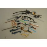 40 Star Wars accessories which includes guns, helmets, lightsaber etc (40).