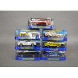 7 boxed slot cars by Scalextric, which includes; #C3070 Nissan GT-R, #C2974 Ferrari 308 GTB etc (7)