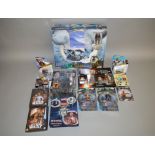 A mixed lot which includes The Golden Compass figures, Star Wars set, Terminator 2 figure etc.