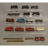 HO/OO Gauge. 11 unboxed Locomotives by Lima, Marklin and others together with four unboxed pieces of