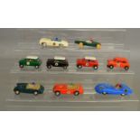 9 unboxed vintage Scalextric slot cars including Austin Healey, Mini Cooper, Lister Jaguar etc.