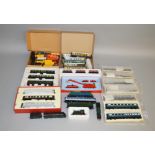 OO Gauge. A good quantity of Locomotives, Coaches and Wagons by Hornby and others, mostly unboxed,