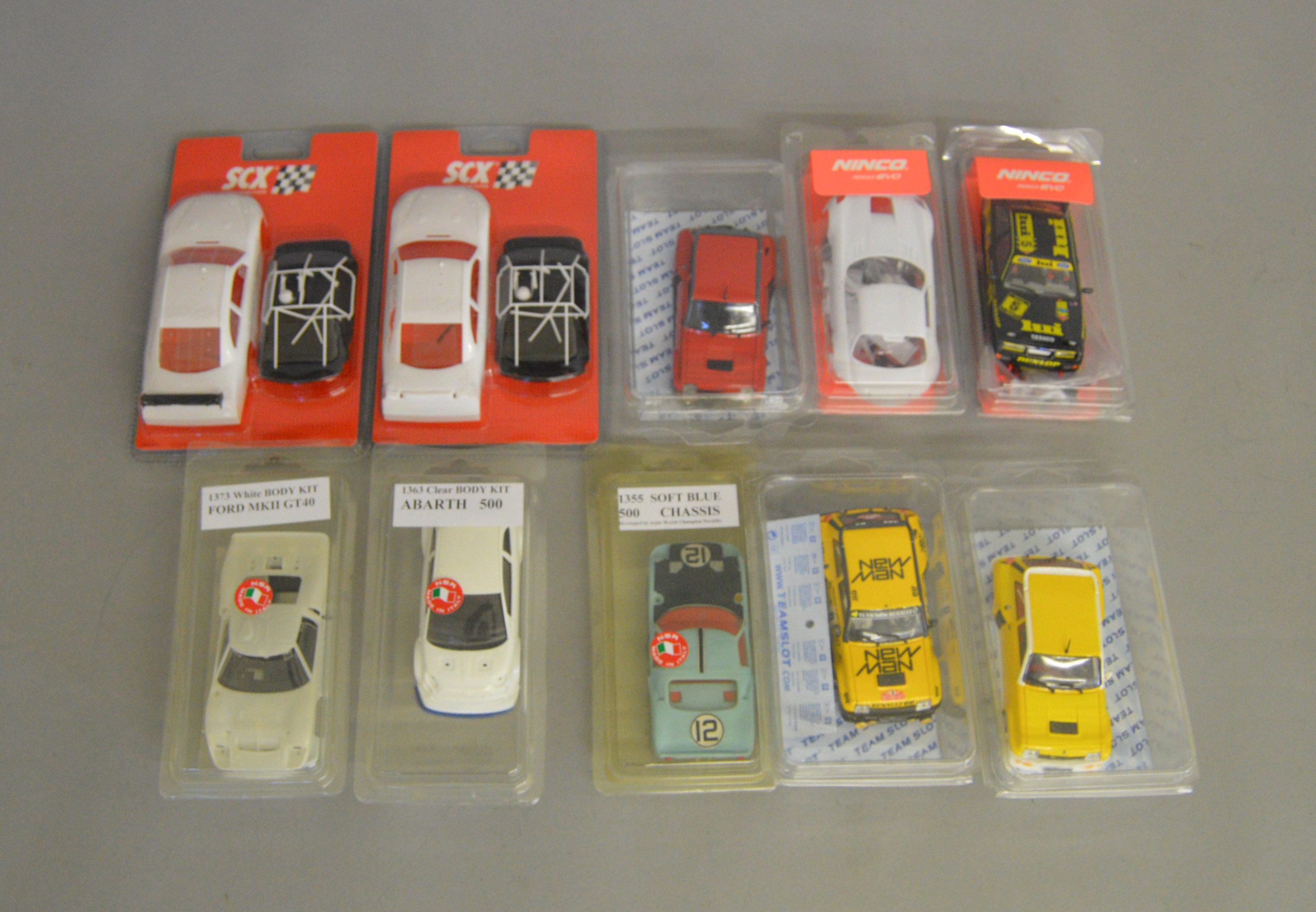 10 Slot Car Body Kits in original packaging including examples by SCX  Team Slot, Ninco etc. (10)
