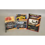 8 boxed Scalextric/Superslot slot cars, which includes; #C.284 Police Rover, #C.2105 Mclaren  etc (