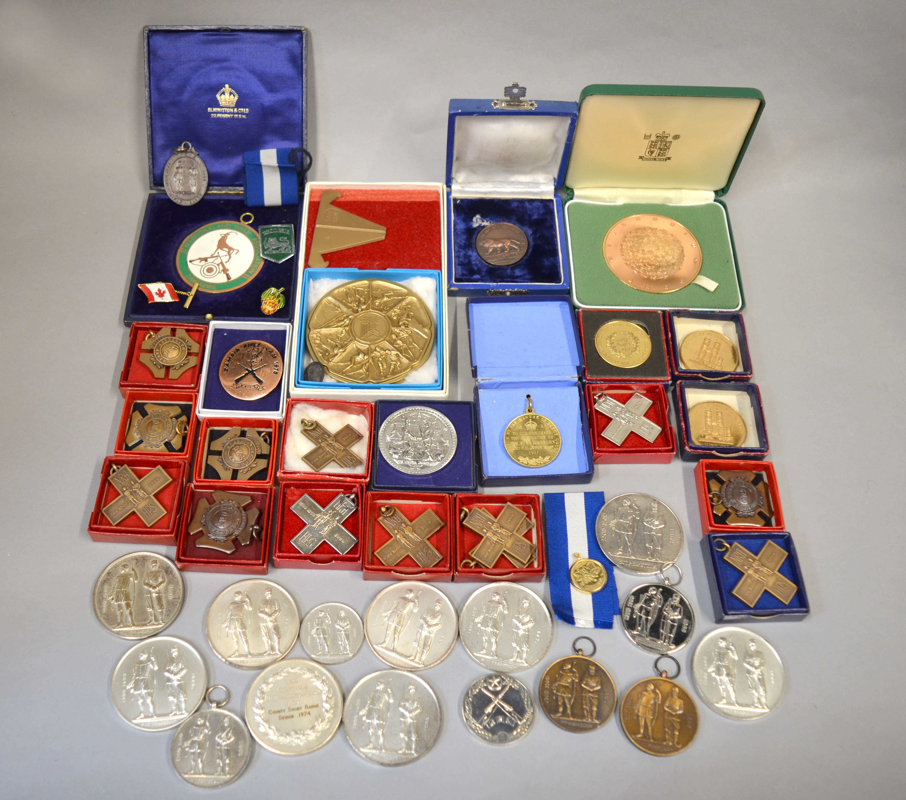 A large quantity of National Rifle Association medals/medallions (28) together with other