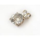 A diamond solitaire pendant approx 2.00cts (8mm x 5mm), approx colour J/K, clarity I1/2, set in a