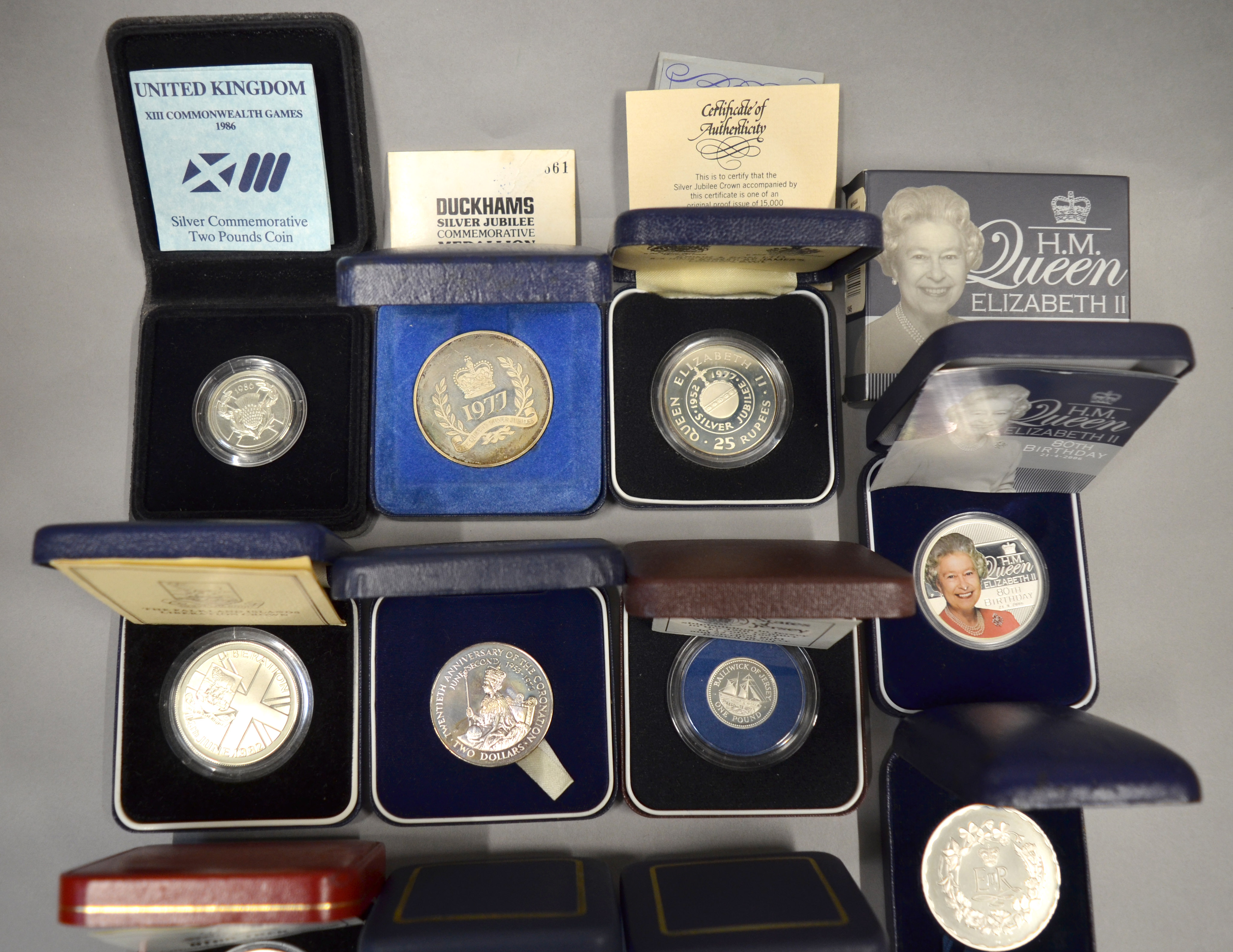 A boxed quantity of silver proof coins/medallions to include Spink & Son 25 Rupee commemorating - Image 2 of 3