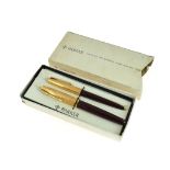 Two Parker pens, a fountain 51 & ball point, both with gold plated lids, in a fitted case