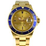 ROLEX - An 18ct yellow gold Rolex Submariner Automatic gents wristwatch, dated 1995, model 16618,
