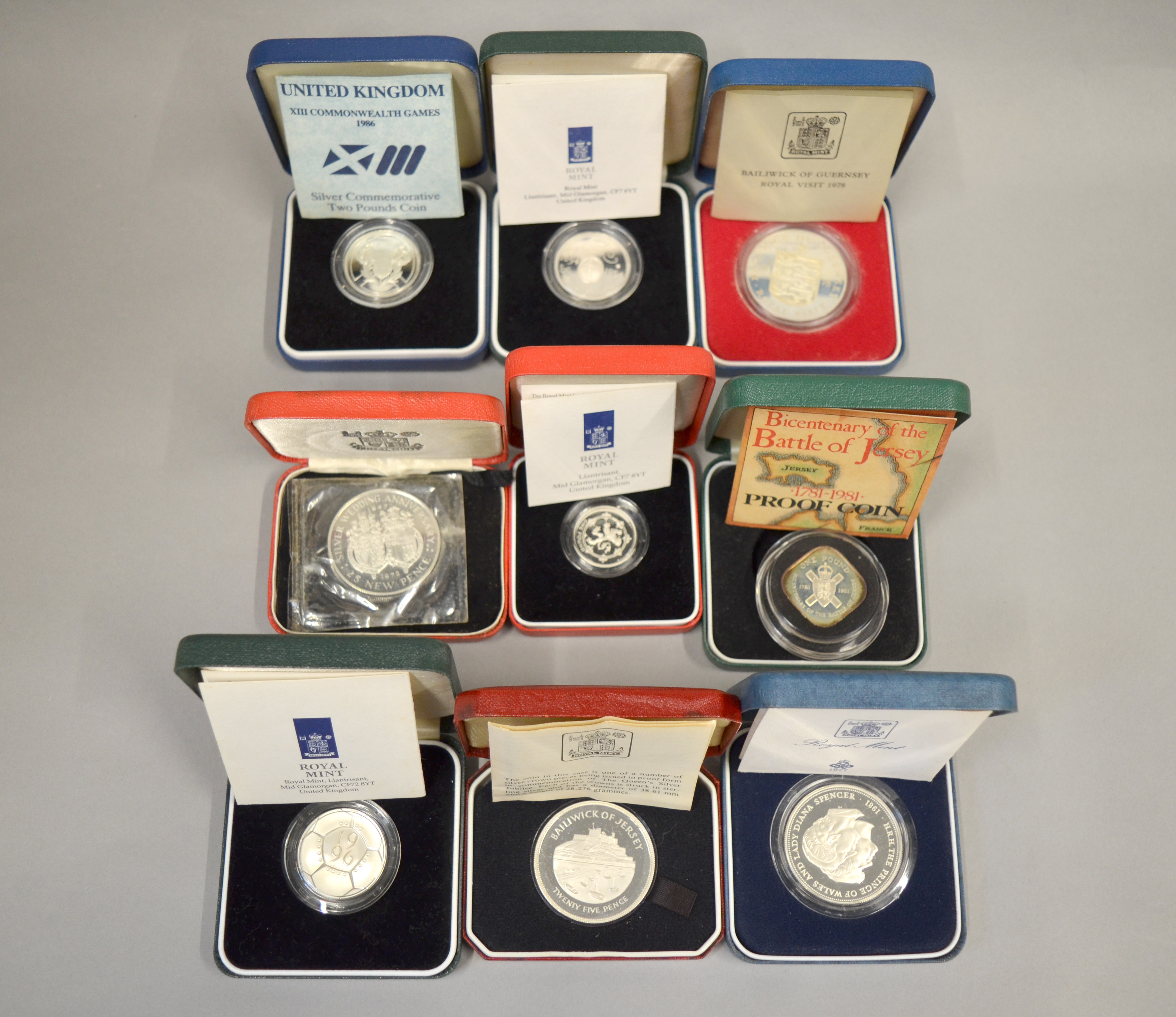 ROYAL MINT - Nine silver proof commemorative coins/medallions to include The Queens Silver Wedding