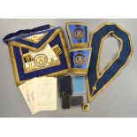 A Masonic apron & cuffs together with a jewel, collar & other ephemera to Brittania Lodge 3005