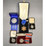 A small boxed quantity of medals to include an Imperial Service Medal in fitted case, The Royal