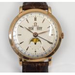 OMEGA - A rare early 1950's gents 18ct gold Omega Cosmic Triple Calendar Moonphase mechanical