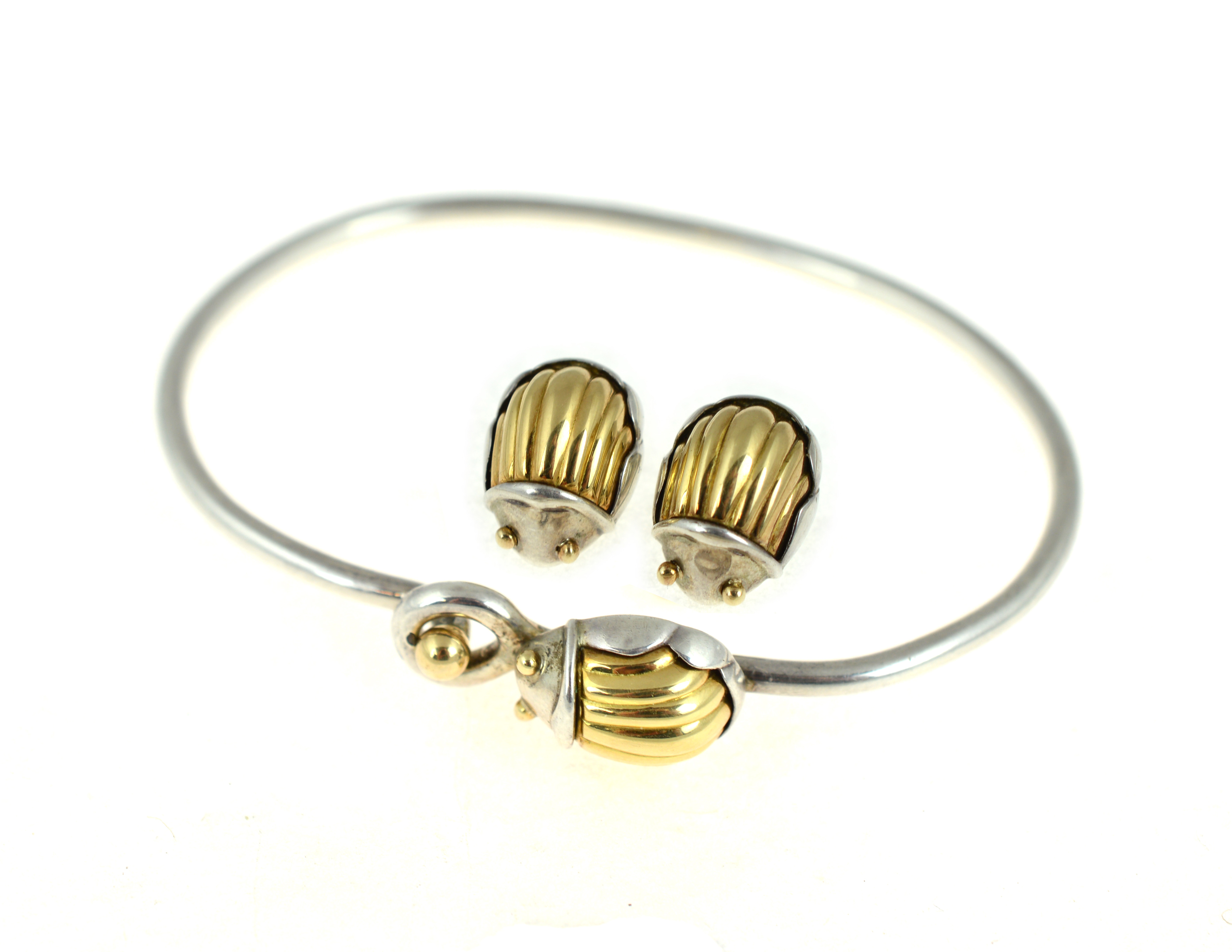 TIFFANY & Co - A matching set of rare 18ct yellow gold & silver Tiffany scarab bangle & earrings,