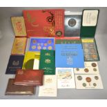 A boxed quantity of world proof & uncirculated coin sets