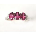 An 18ct white gold Rubelite & Diamond ring, approx rubelite weight 1.21cts, size O, approx gross
