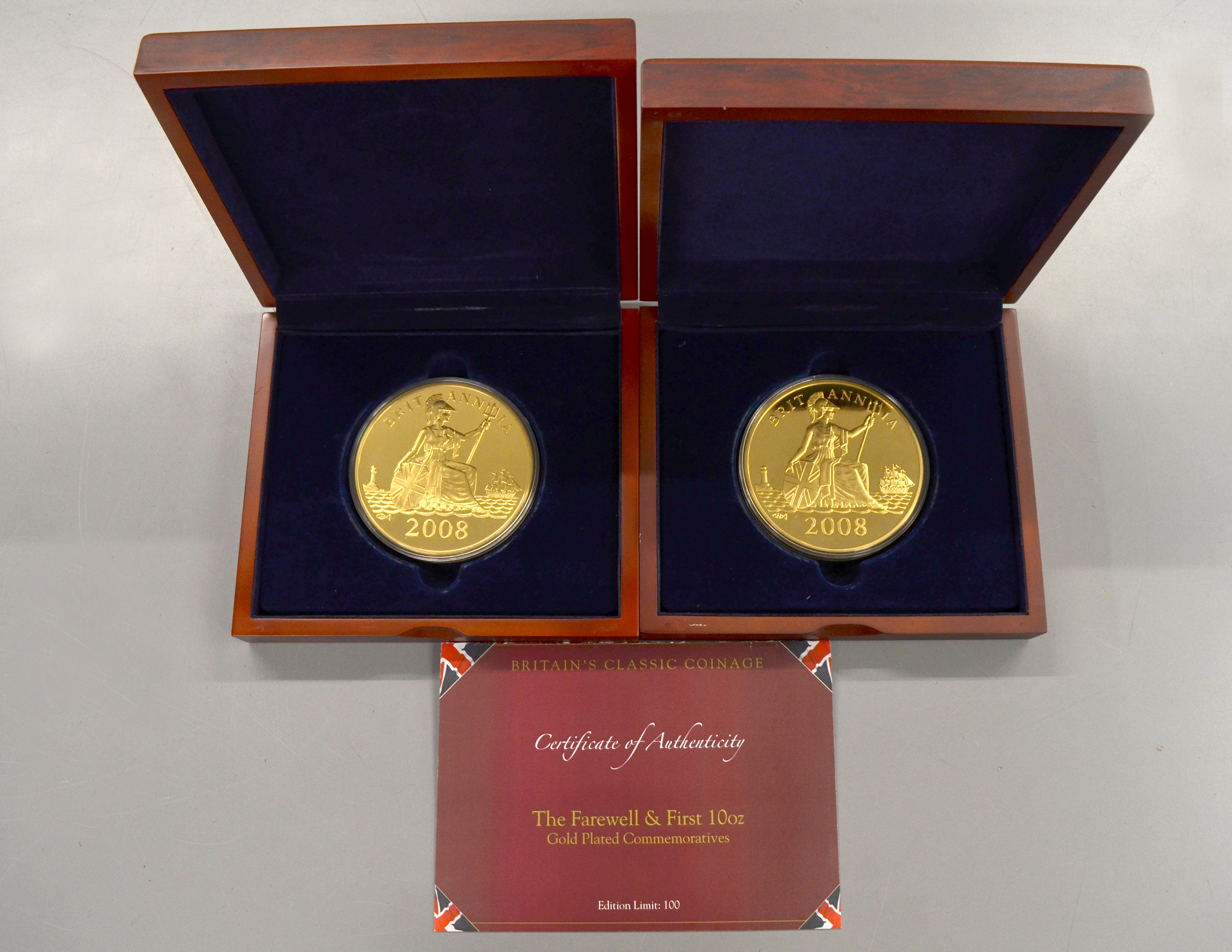 WESTMINSTER - 'The Farewell & First 10oz Gold Plated Commemoratives' boxed coin sets, limited