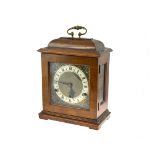A wooden cased mantle/carriage clock, British made ABEC, without key