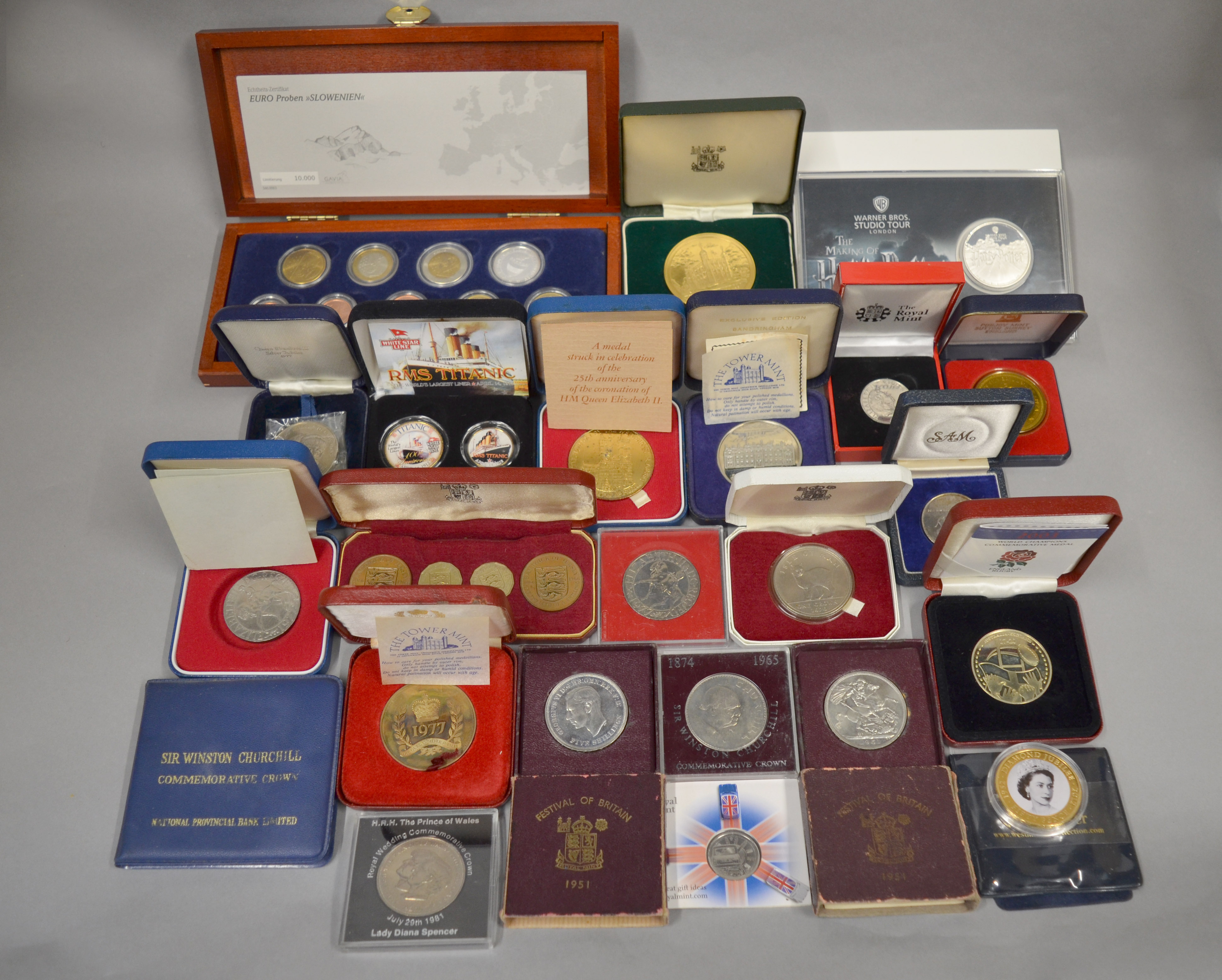 A boxed quantity to include coins & medallions from around the world, some Royal Mint