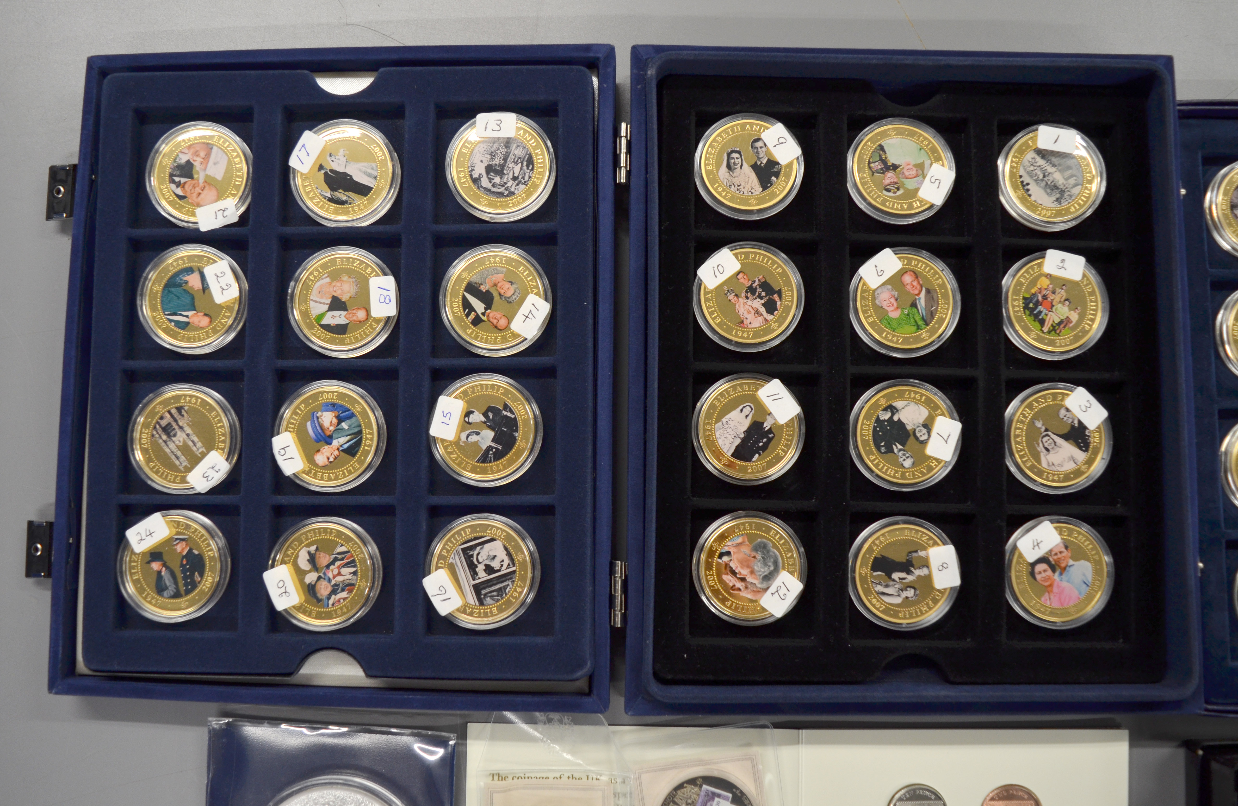 A boxed quantity of commemorative coins/medallions to include forty eight boxed $1 Dollar Cook - Image 2 of 3