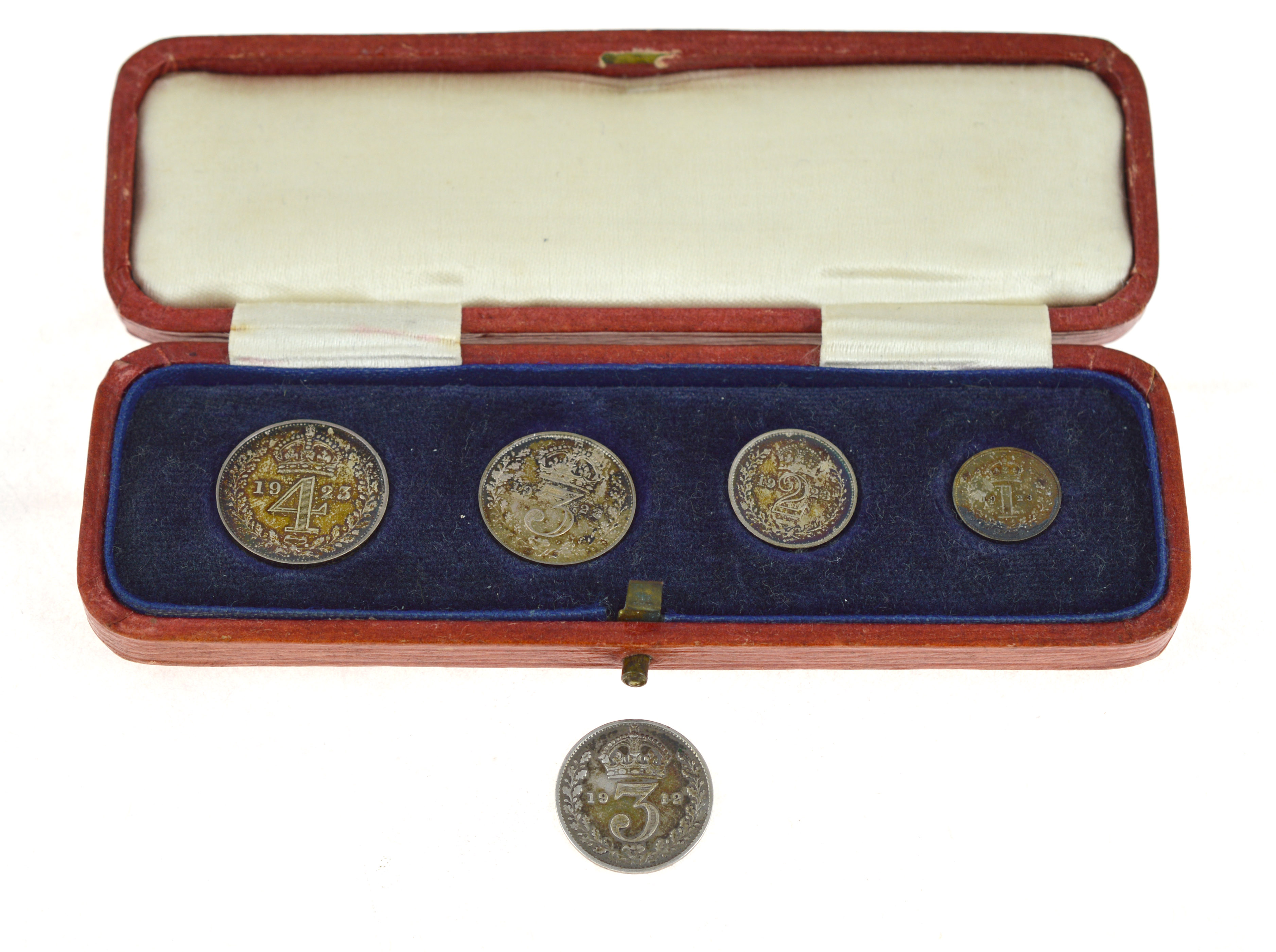 A 1923 Maundy complete silver coin set, in original fitted leather box together with a single 1912