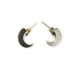 A pair of 18ct H/M black and white diamond set claw shaped earrings, approx gross weight 6.6gms