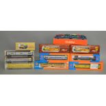 HO Gauge. A boxed Roco 2 car Tram together with various boxed Wagons by Liliput, Roco and