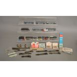 N Gauge. A small collection of unboxed Railway items including 2 Locomotives and 5 Coaches  by