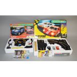 2 boxed Scalextric sets, 'GT40 Sport' and 'Mini Champions'. (2)