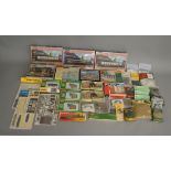 OO Gauge. A good quantity of boxed and bagged railway related kits and accessories by Peco, Revell