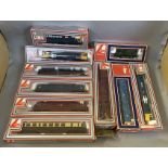 OO Gauge. 10 boxed Lima Locomotives including 7 Diesels, a GWR Railcar, a 2-6-0 BR black Steam