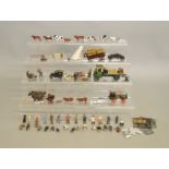 O Gauge. Over 50 unboxed plastic and metal animal and people figures together with six metal
