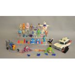 14 Ghostbusters figures by Kenner, along with ghosts, Ecto-1, proton packs for figures etc.