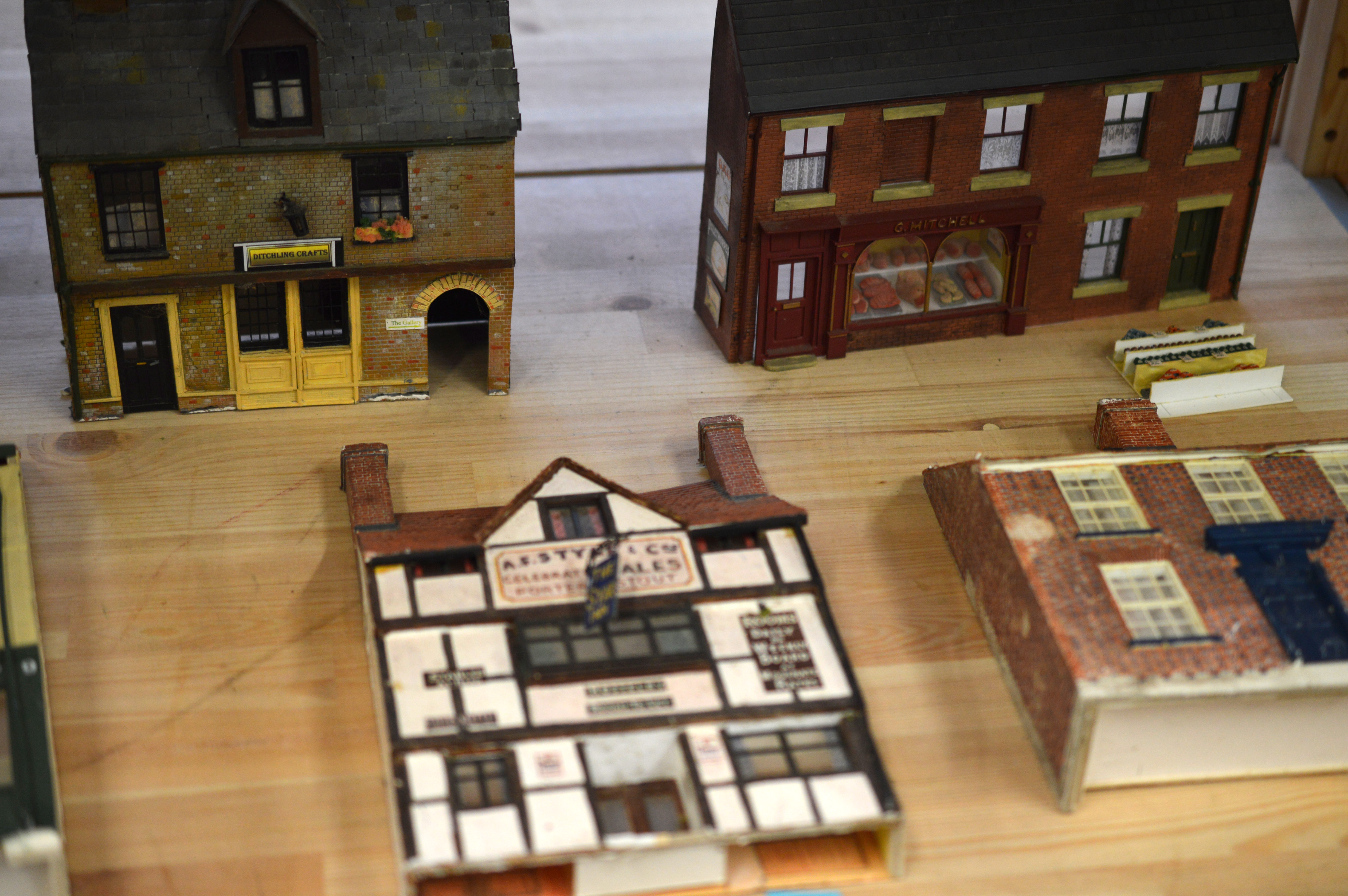 OO Gauge. 24 Trackside Buildings, mostly shops and houses, including Public Houses, Newsagent, - Image 4 of 10