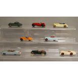 8 unboxed Dinky Toys including 157 Jaguar, 38d Alvis and 106 Austin Atlantic. Models have varying