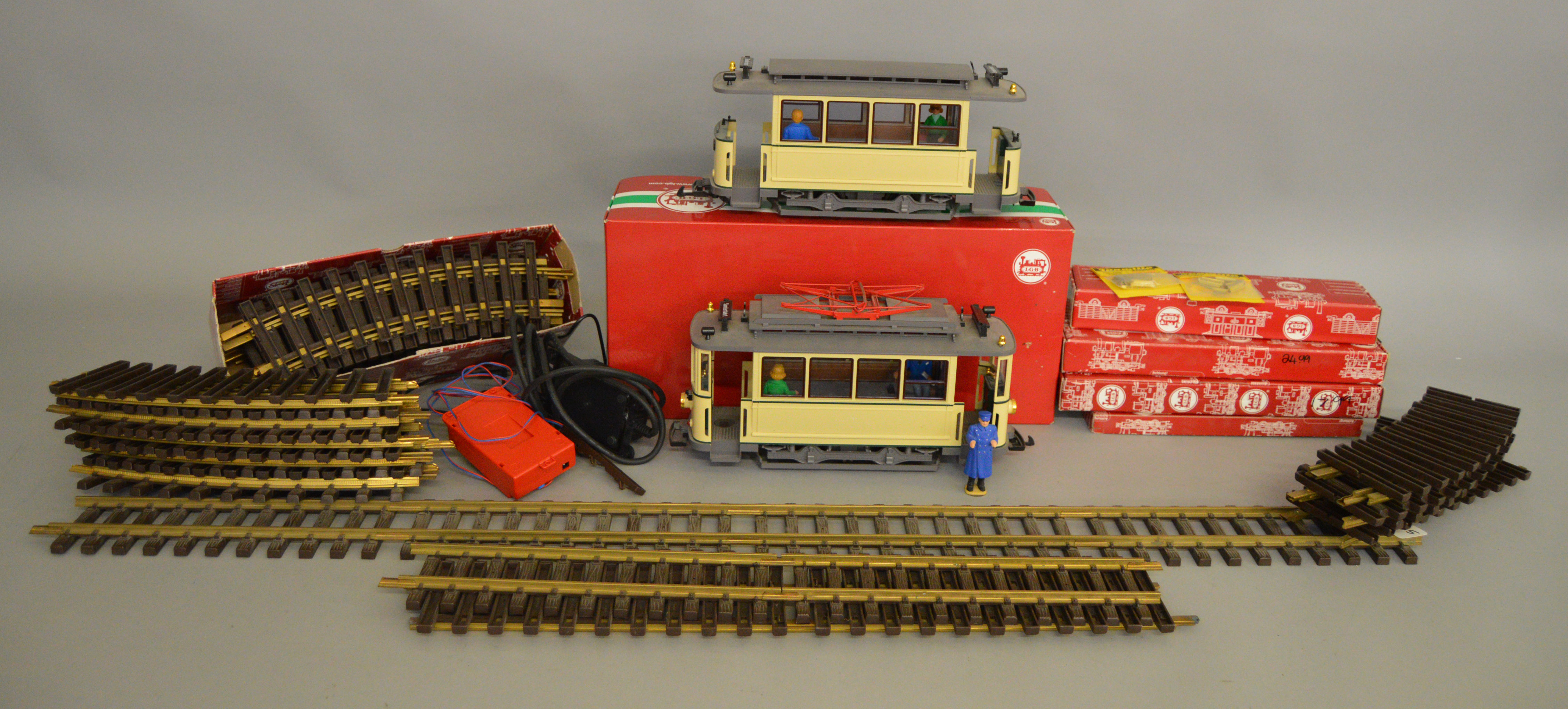 G scale. A very good quantity of LGB railway items including two Street Cars, one motorised, one