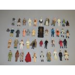 42 Star Wars figures, which includes; Jawa, Snaggletooth, Chewbacca, Teebo, Hans Solo in Carbonite