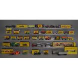 A quantity of boxed Matchbox diecast models, mostly with varying degrees of play wear in original