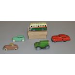 A small selection of unboxed diecast and tinplate vehicles including Tootsietoys Coupe and Sedan