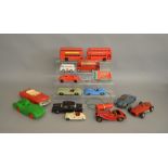 14 unboxed vintage vintage Plastic and Tinplate vehicles including a scarce Tri-ang #290 large scale