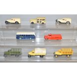 8 unboxed Dinky Toys including 2 x 25f Market Gardeners Wagons and 2 x 30F Ambulance models.