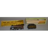 O Gauge. A boxed Bassett Lowke LMS 4-4-0 Locomotive '1063' with six wheel Tender, appears