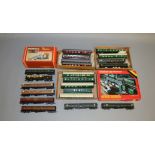 21 unboxed Coaches in various different liveries, mostly branded Triang or T.T.R, together with